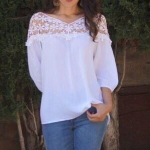 White top with crochet details Size S